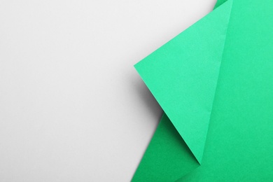 Photo of Colorful paper sheets as background, top view