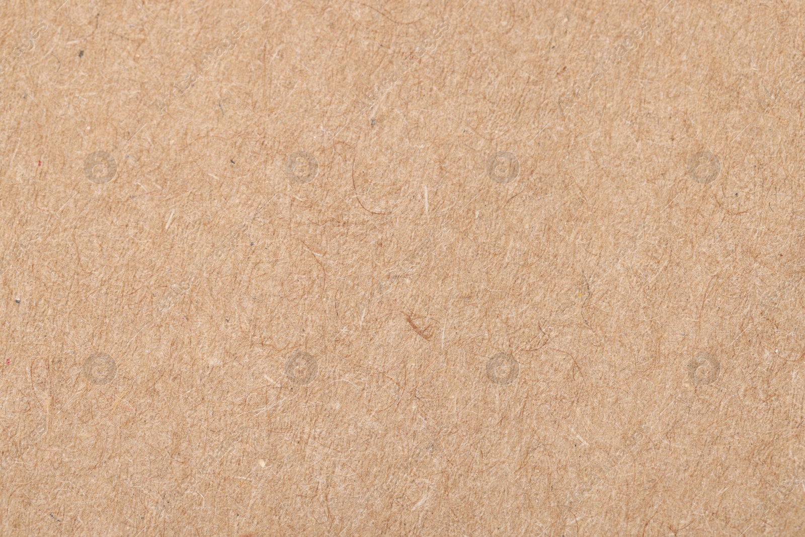 Photo of Texture of beige paper sheet as background, top view