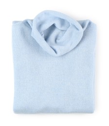 Photo of Folded light blue cashmere sweater isolated on white, top view