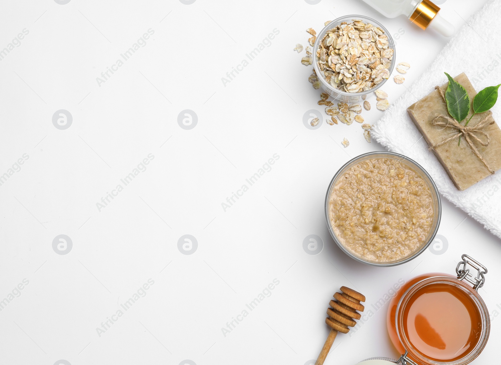 Photo of Composition of handmade face mask and ingredients on white background, top view