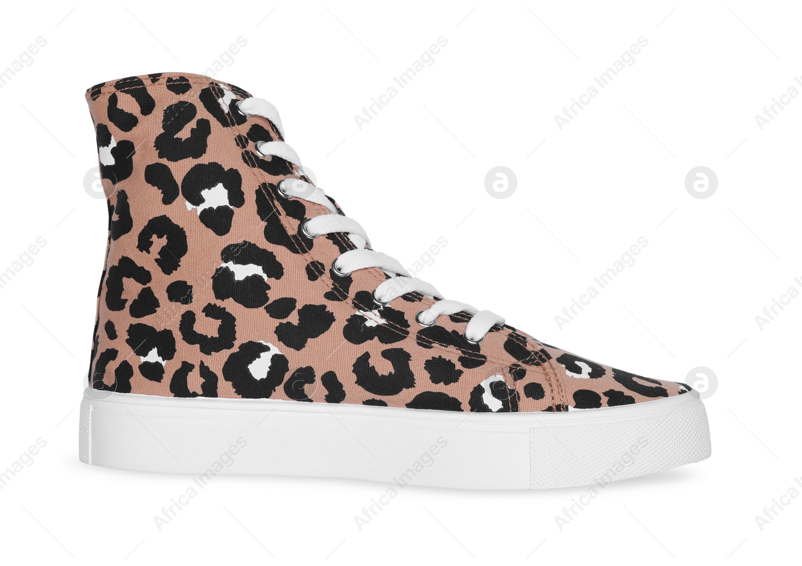 Photo of Classic old school sneaker with leopard print isolated on white, top view