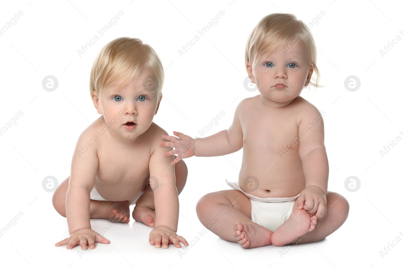 Image of Portrait of cute twin babies on white background