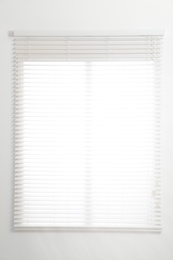 Photo of Modern window with open blinds in room