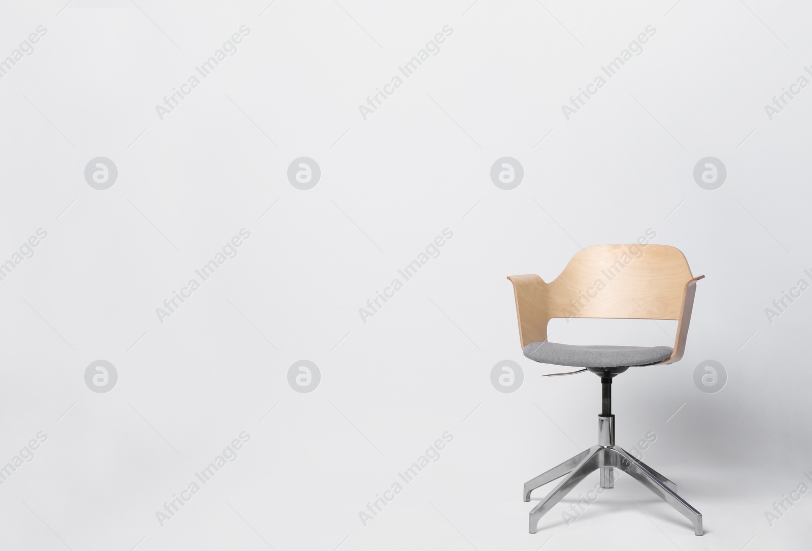Photo of Comfortable office chair on white background, space for text