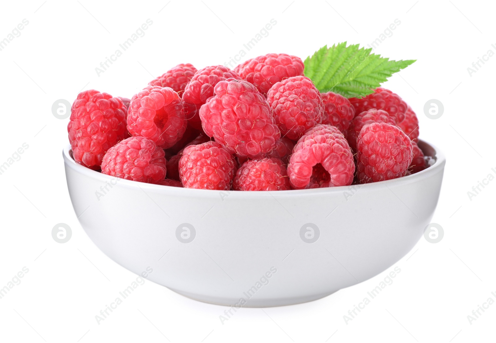 Photo of Delicious fresh ripe raspberries in bowl isolated on white