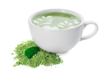 Delicious matcha latte in cup, powder and leaf on white background