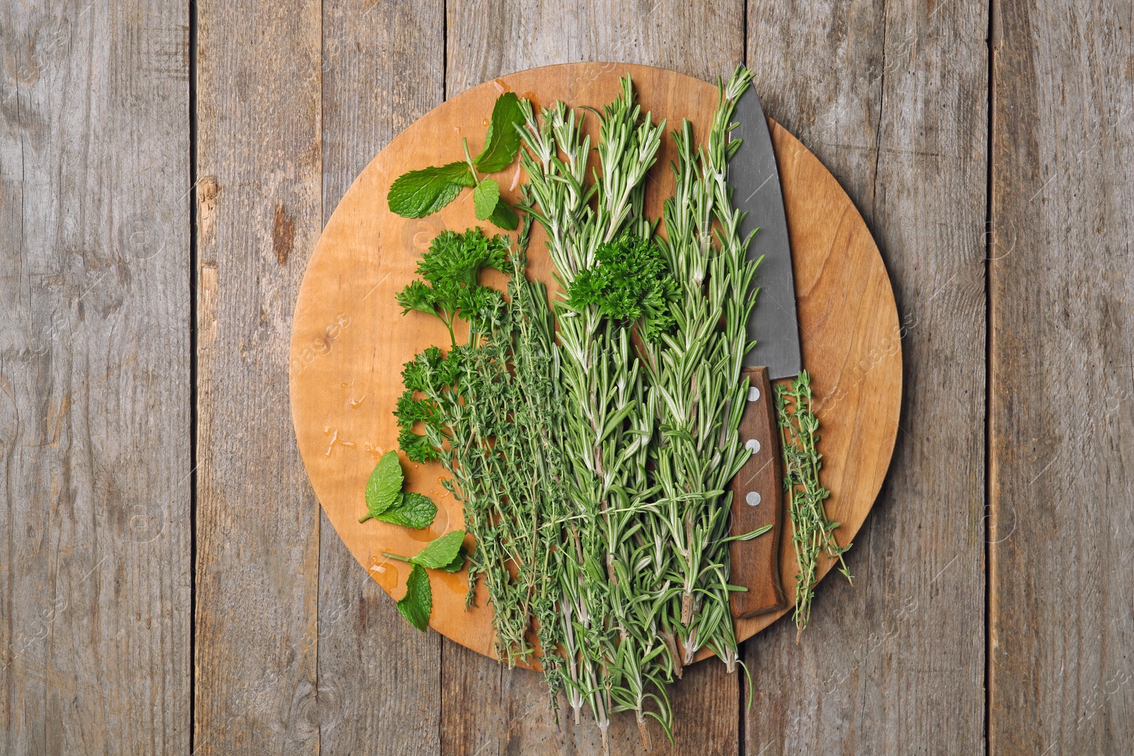 Photo of Flat lay composition with rosemary on table. Aromatic herbs