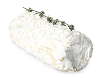 Photo of Delicious fresh goat cheese with thyme on white background