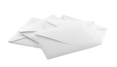 Photo of Heap of paper envelopes on white background