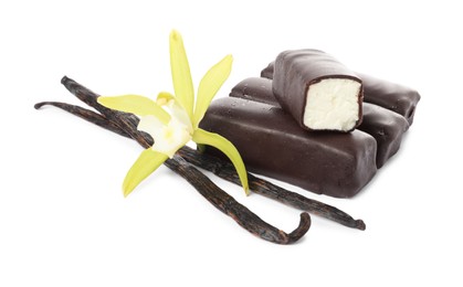 Photo of Glazed curd cheese bars, vanilla pods and flower isolated on white