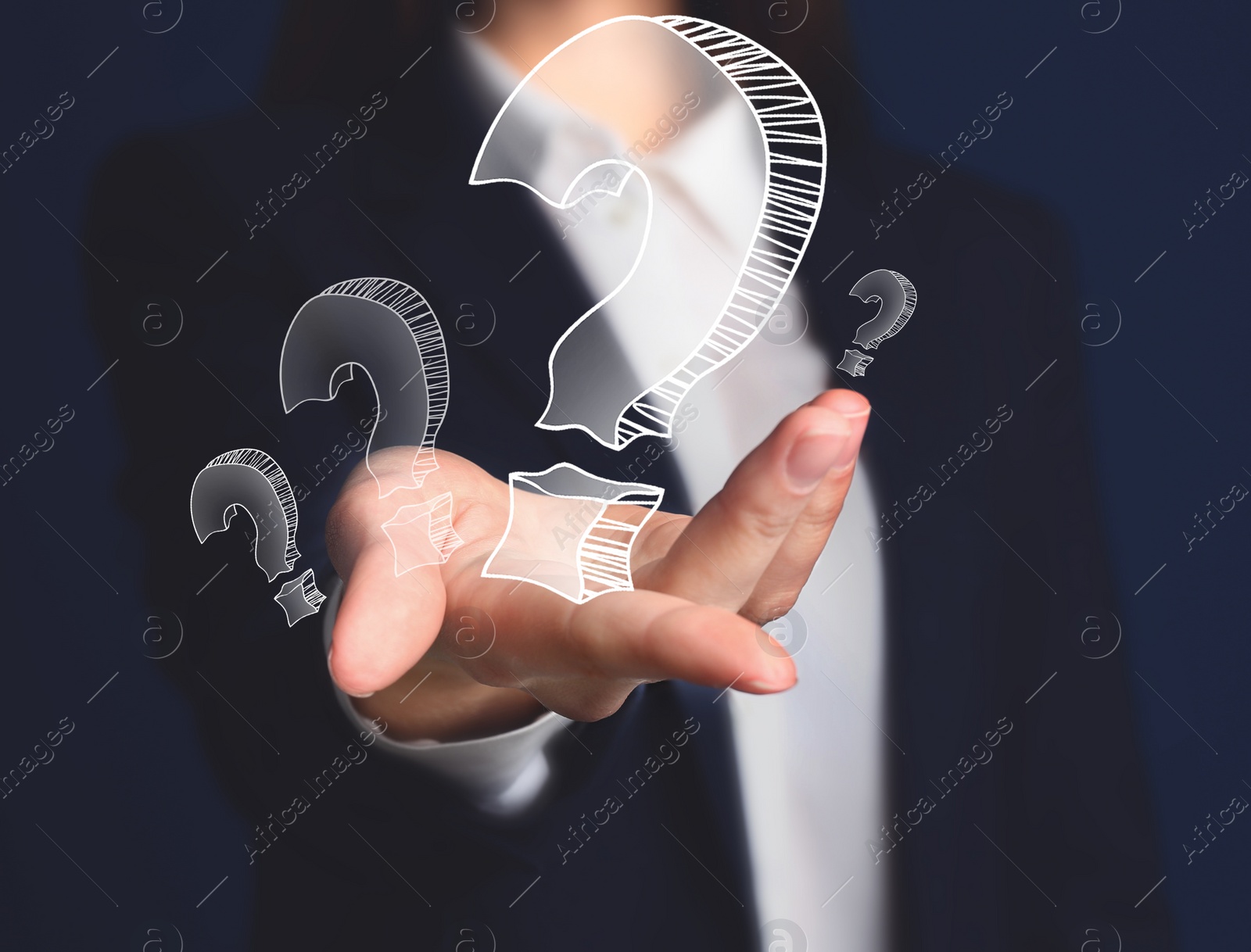 Image of Businesswoman on blue background demonstrating drawing of question mark