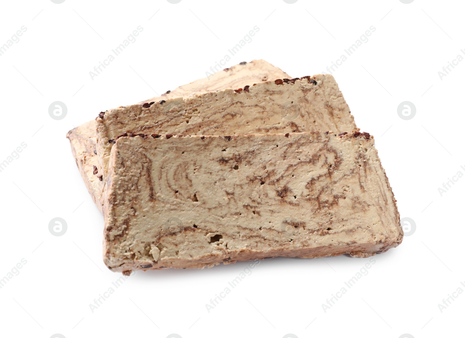 Photo of Pieces of tasty chocolate halva isolated on white