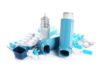 Photo of Composition with asthma inhalers on white background