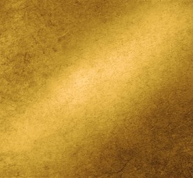 Image of Golden textured surface as background, closeup view