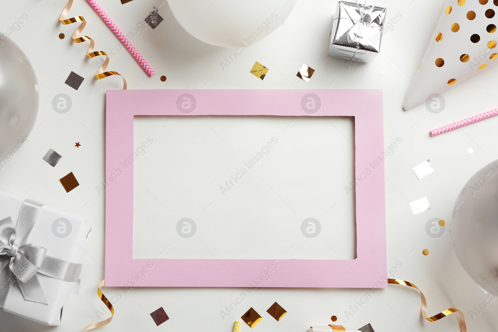 Photo of Flat lay composition with party accessories and space for text on light background