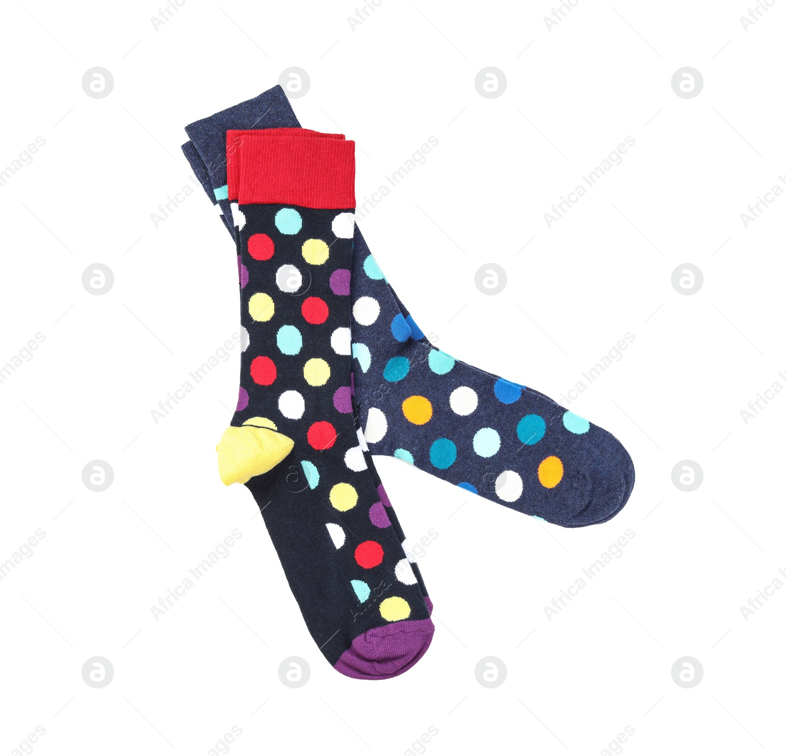 Photo of Colorful socks on white background, top view