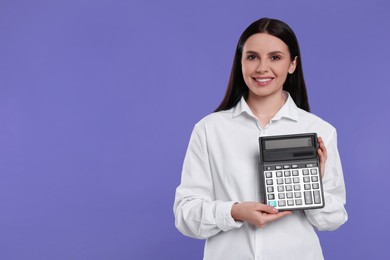 Smiling accountant with calculator on purple background, space for text