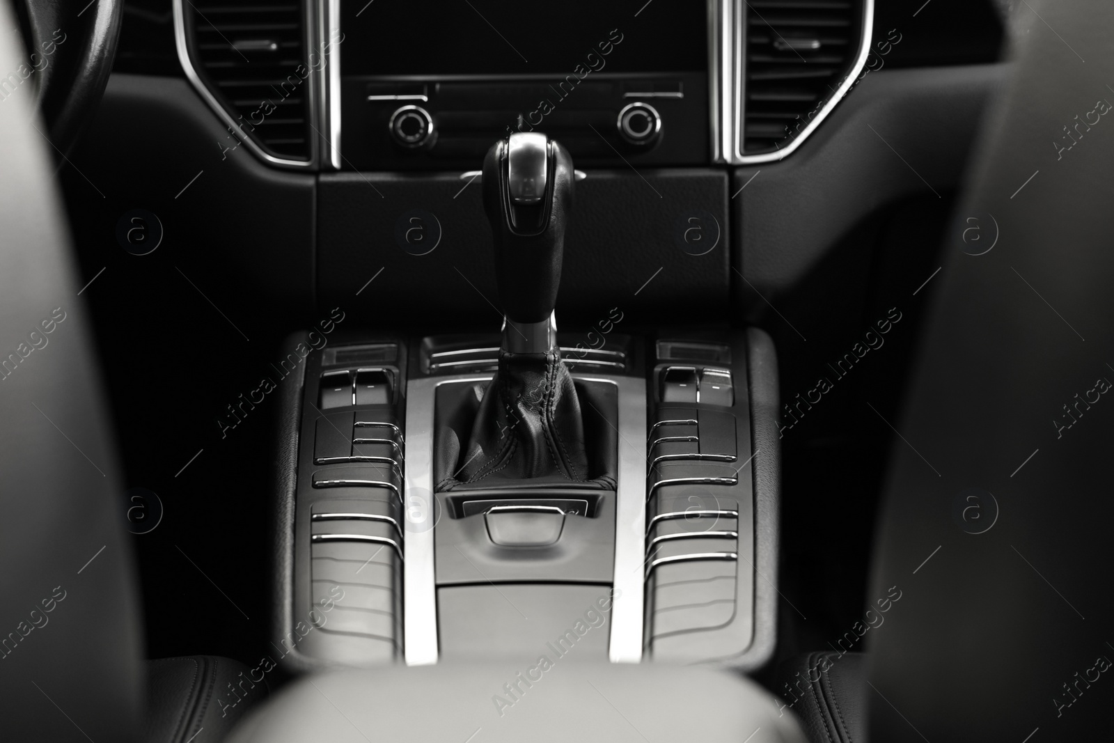 Photo of Gear stick inside of modern black car