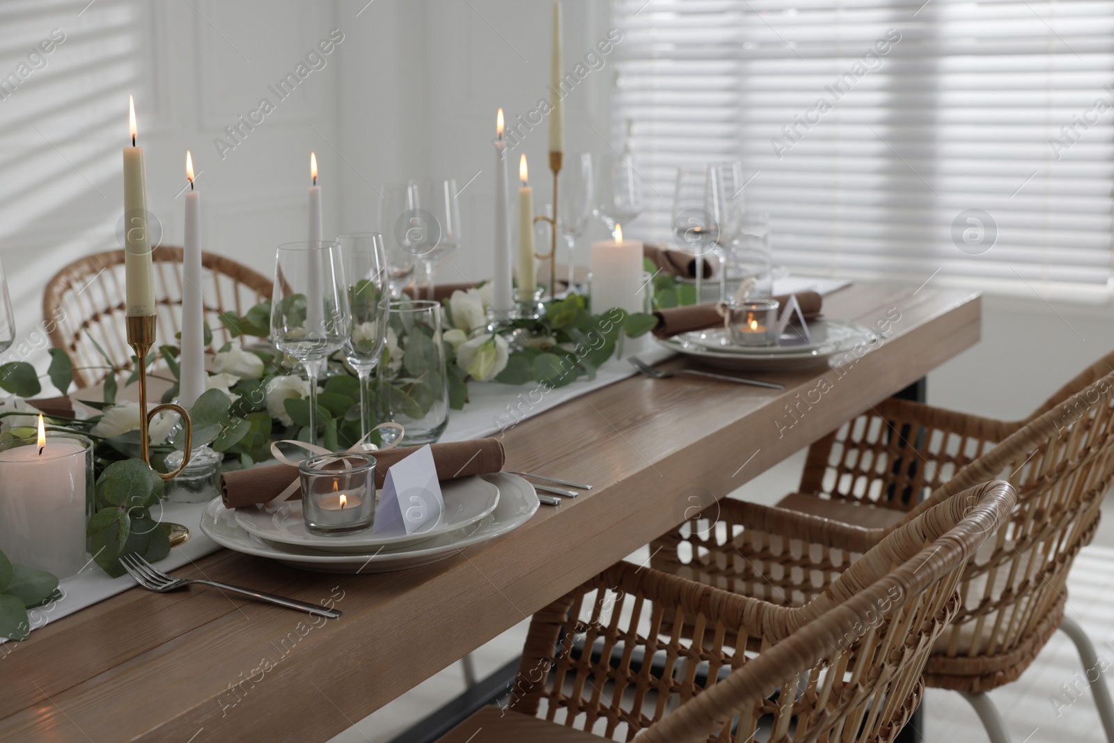 Photo of Festive table setting with beautiful tableware and decor indoors