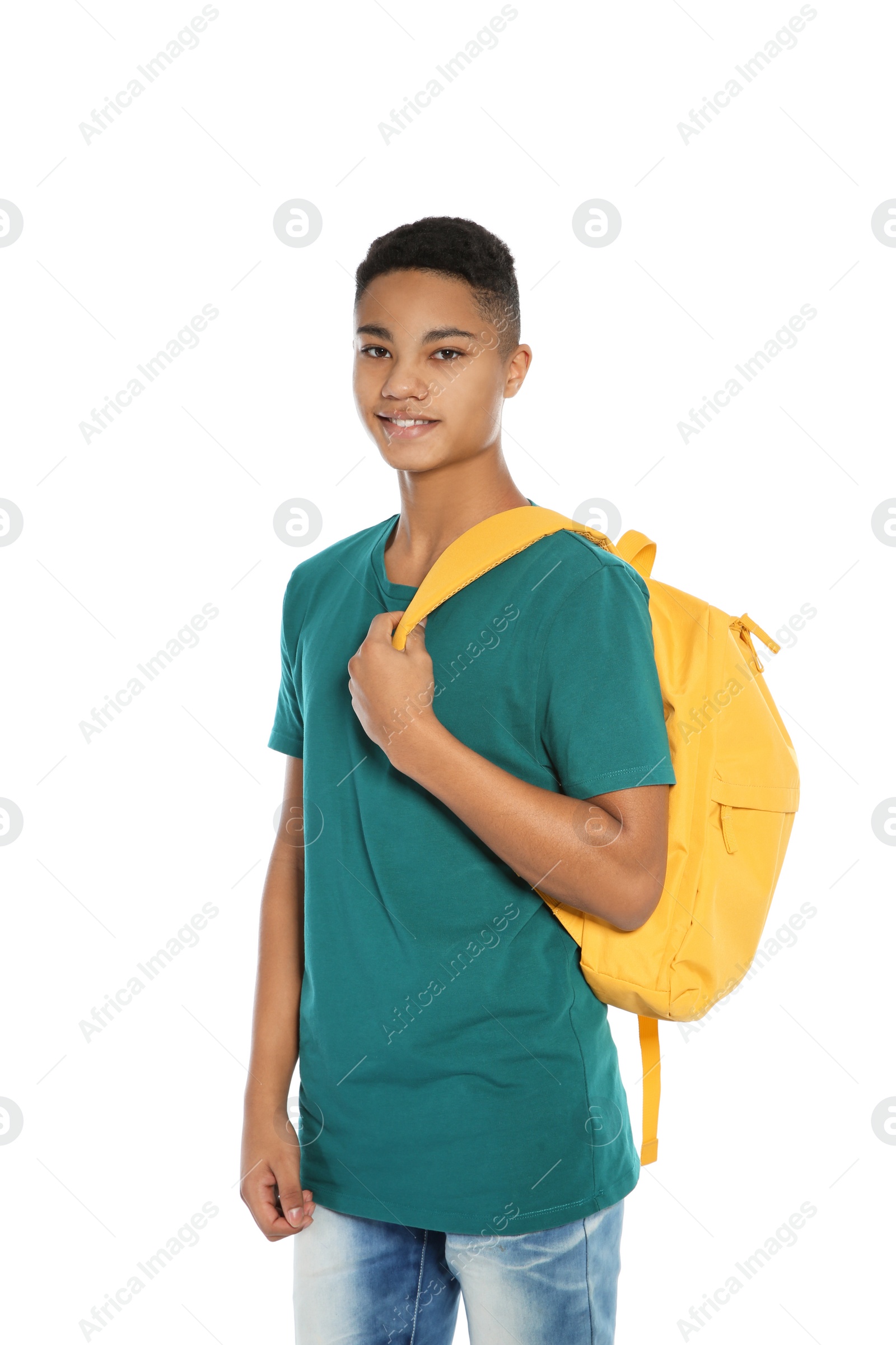Photo of African-American teenager boy in casual clothes on white background