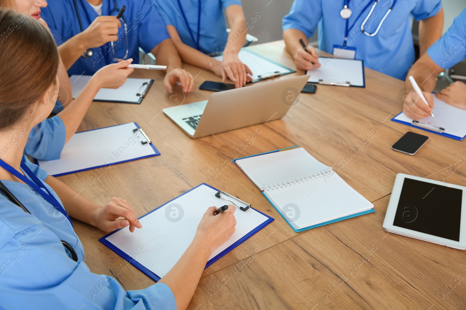 Photo of Medical students studying at university, closeup view