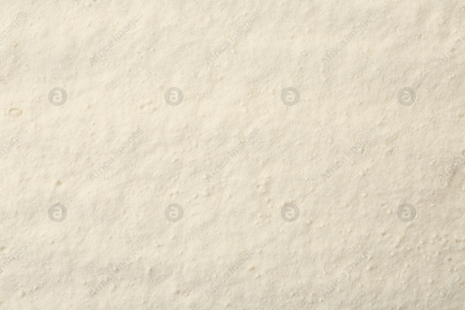 Photo of Texture of baking powder as background, top view