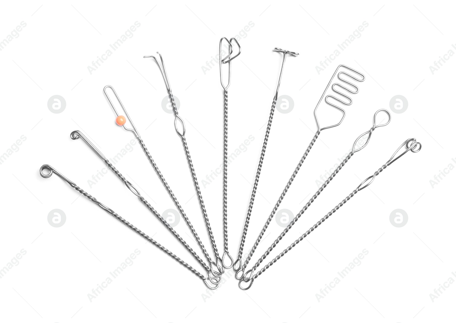Photo of Set of logopedic probes for speech therapy on white background, top view