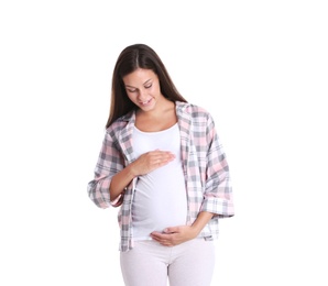 Photo of Happy pregnant woman posing on white background