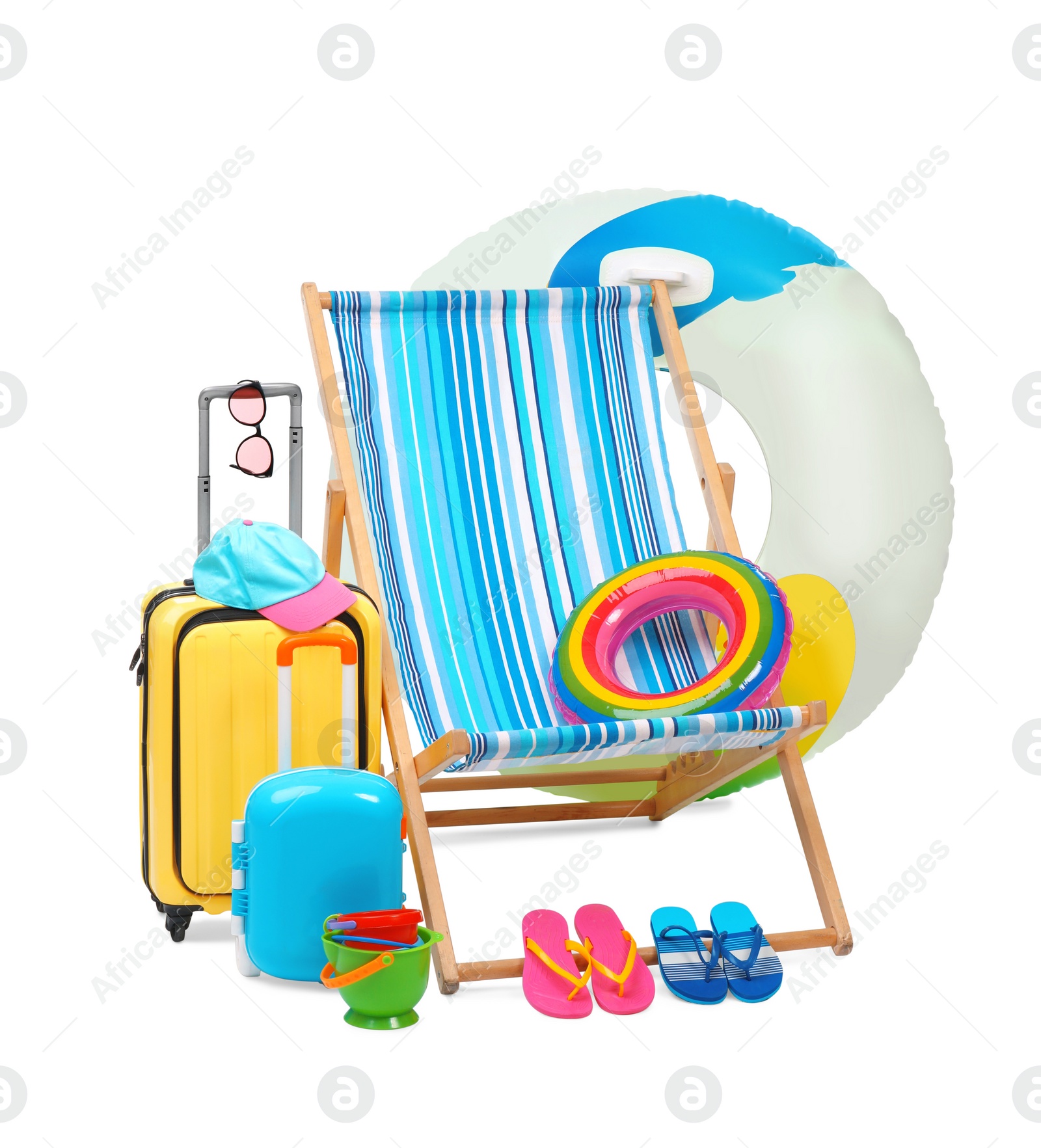 Deck chair, inflatable ring, suitcases and beach accessories isolated on white Photo of Deck chair, inflatable ring, suitcases and beach accessories isolated on white