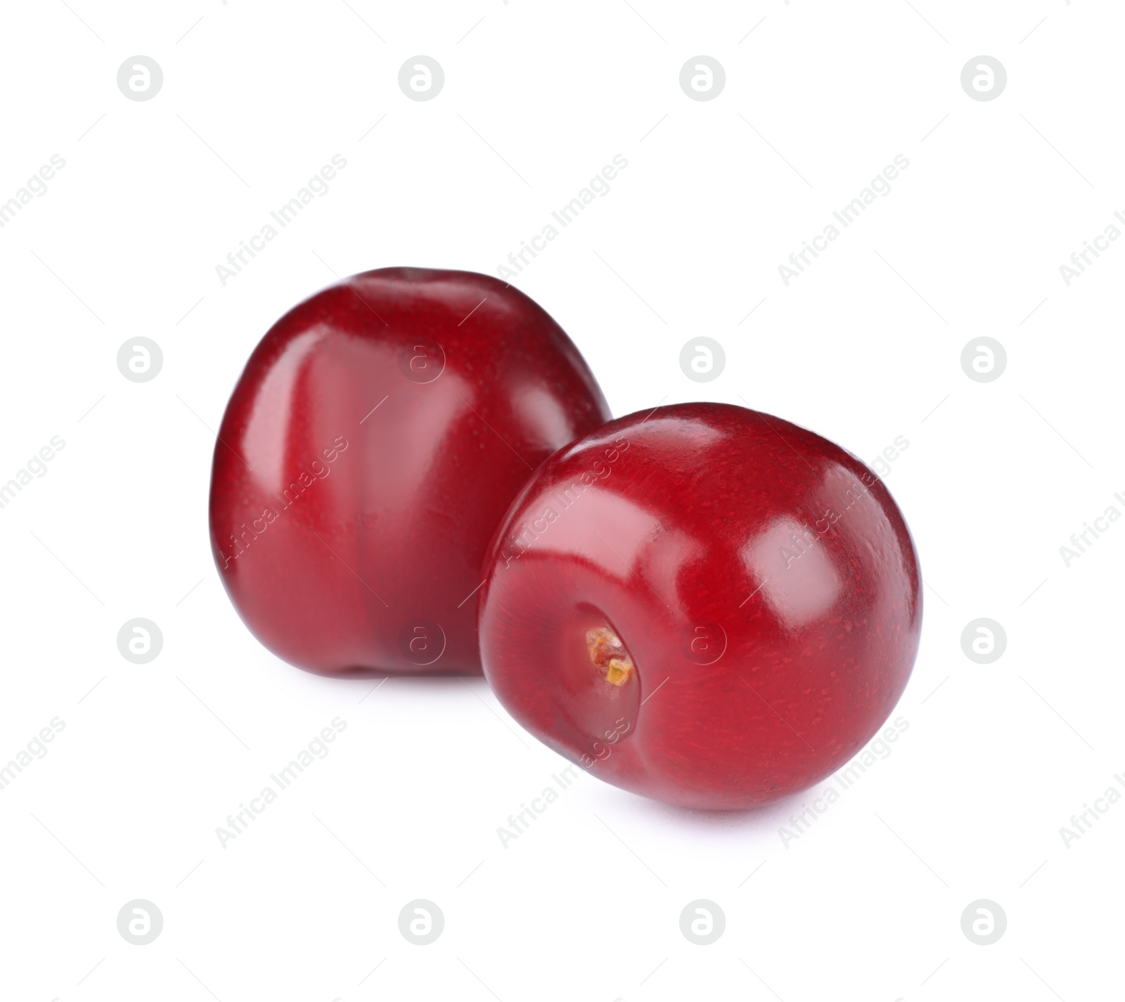 Photo of Tasty ripe red cherries isolated on white