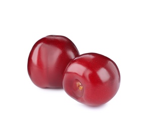 Photo of Tasty ripe red cherries isolated on white