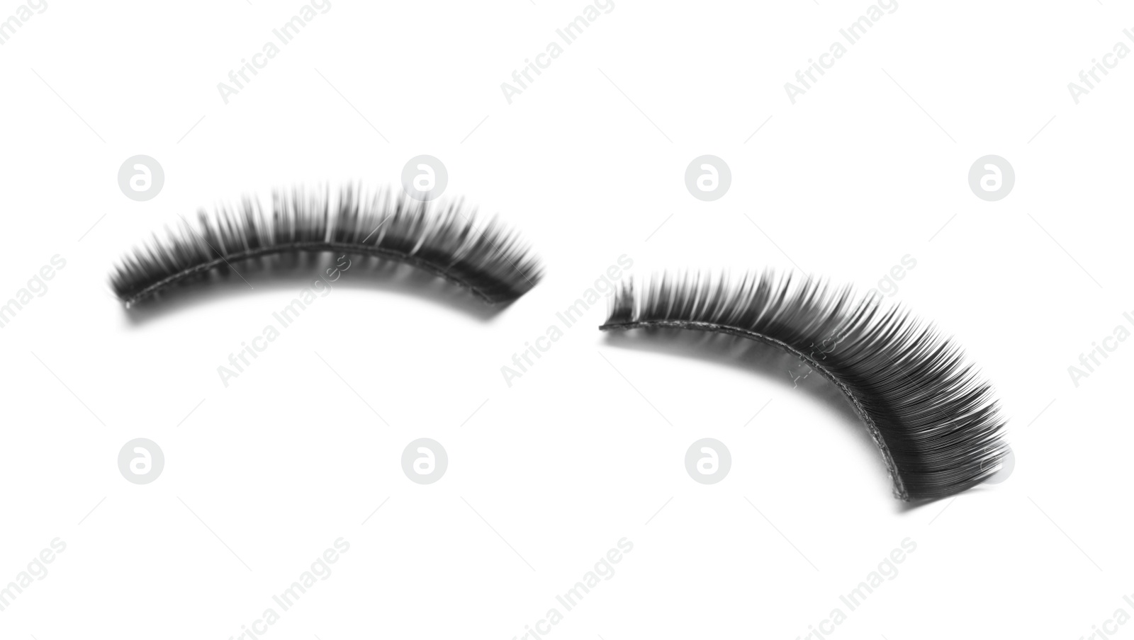 Photo of Beautiful pair of false eyelashes on white background