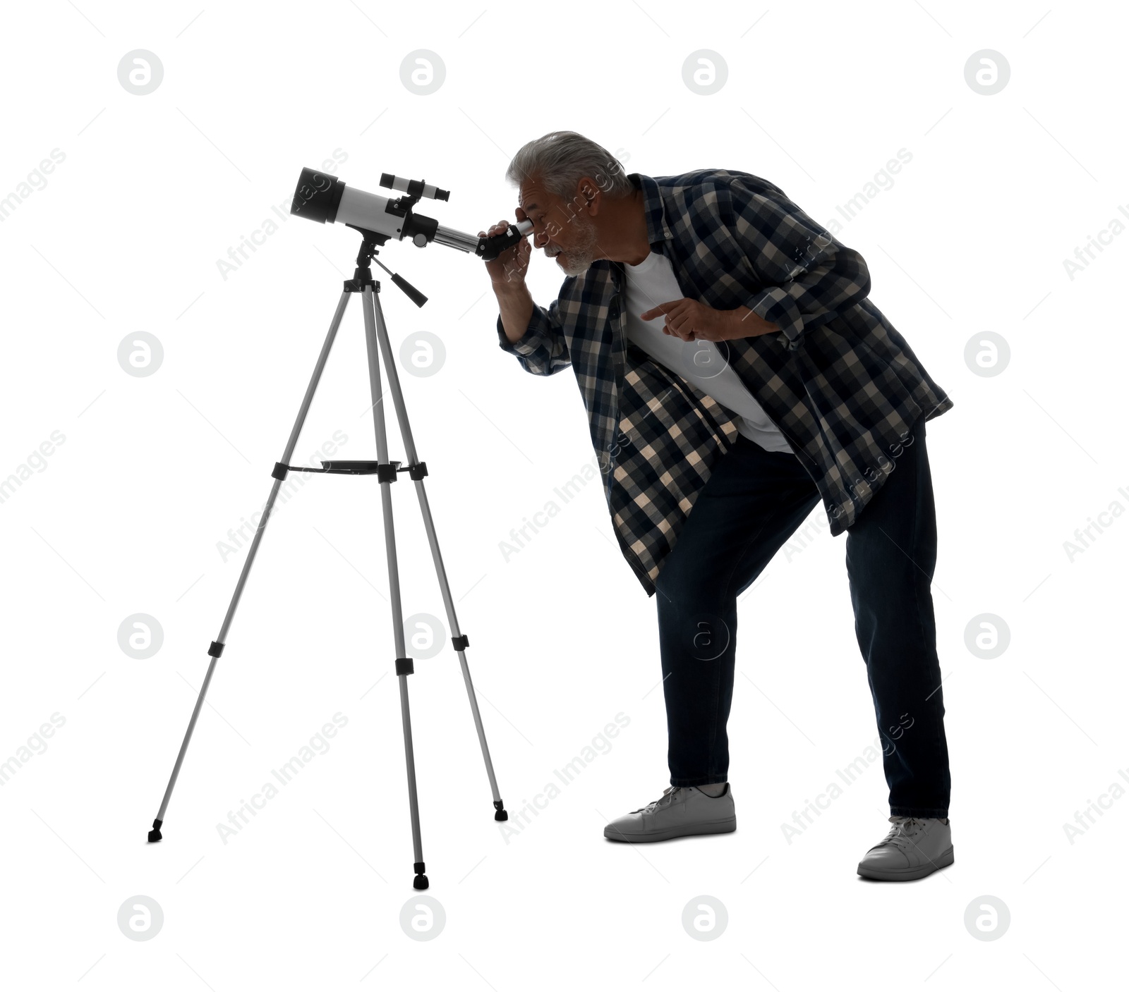 Photo of Senior astronomer looking at stars through telescope on white background