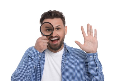 Photo of Happy man looking through magnifier on white background
