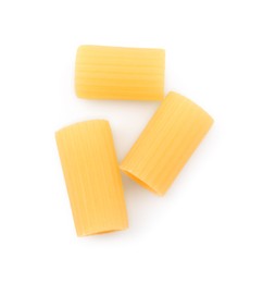 Photo of Raw rigatoni pasta isolated on white, top view