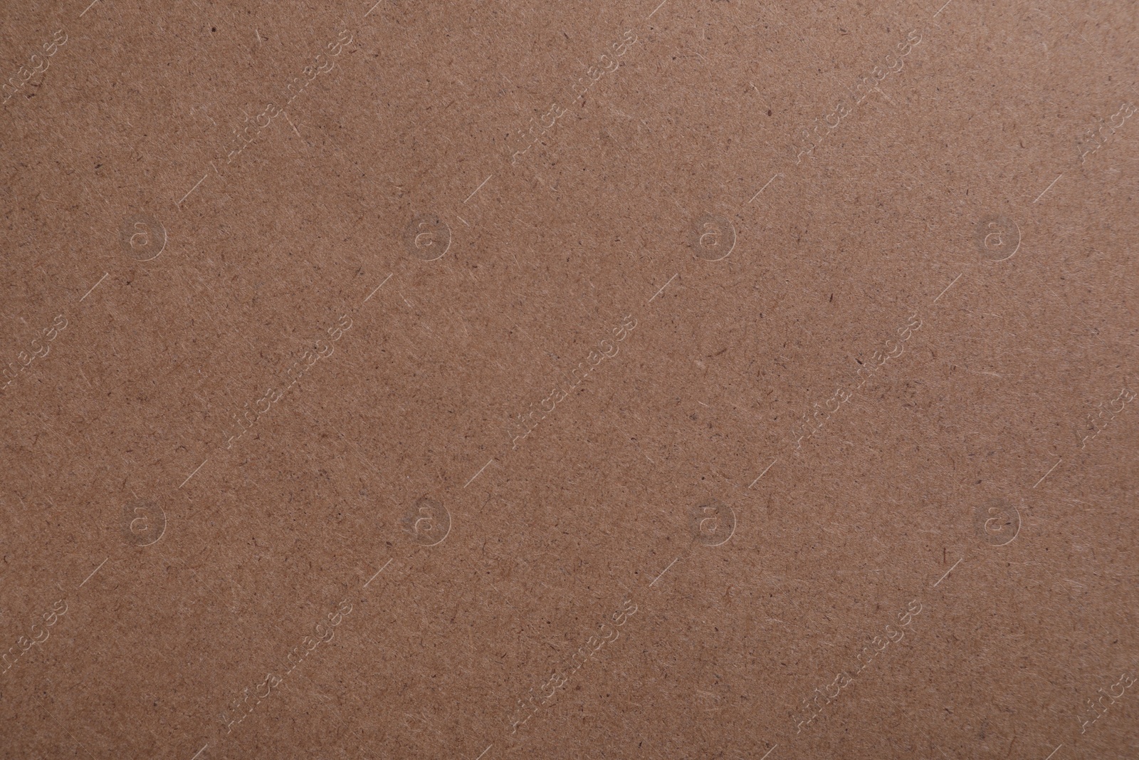 Photo of Texture of kraft paper bag as background, closeup