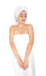 Photo of Portrait of young pretty woman with towels on white background