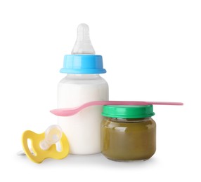 Photo of Healthy baby food, bottle with milk and pacifier on light grey background