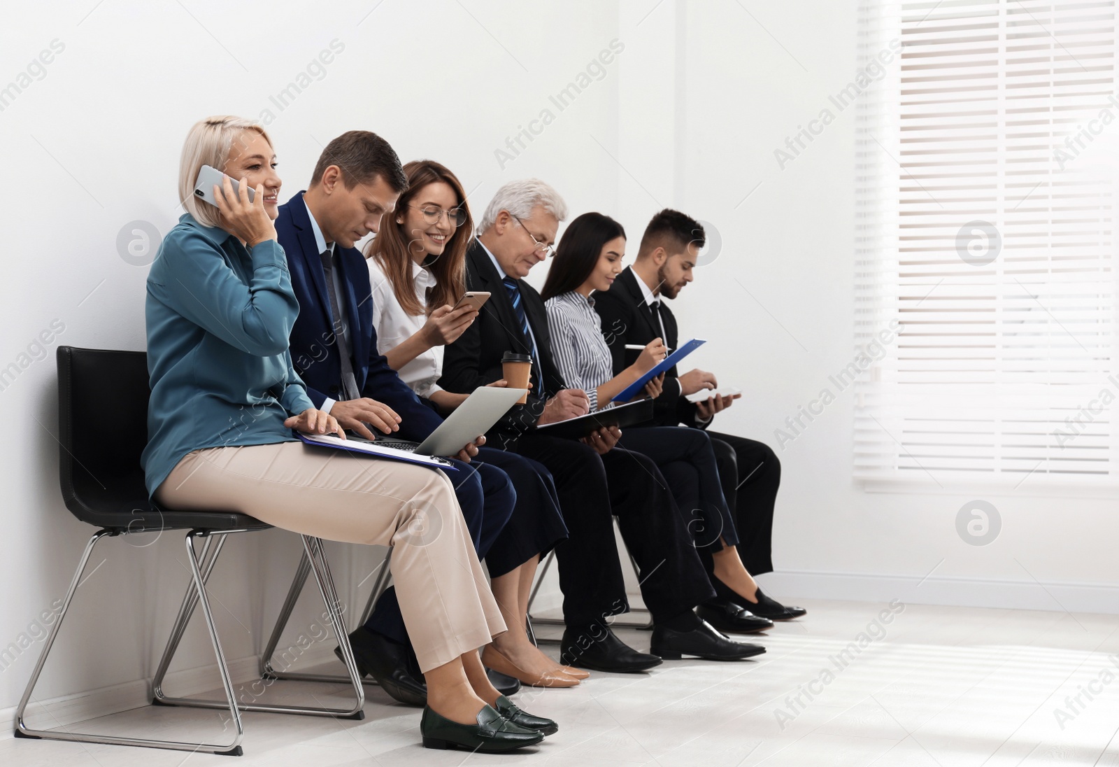 Photo of People waiting for job interview in office