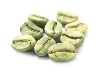 Pile of green coffee beans on white background