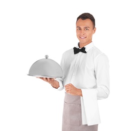 Photo of Waiter holding metal tray with lid on white background