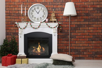 Modern fireplace decorated for Christmas in living room