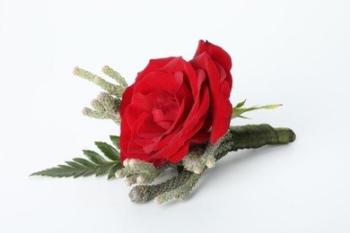 Photo of One stylish red boutonniere on white background