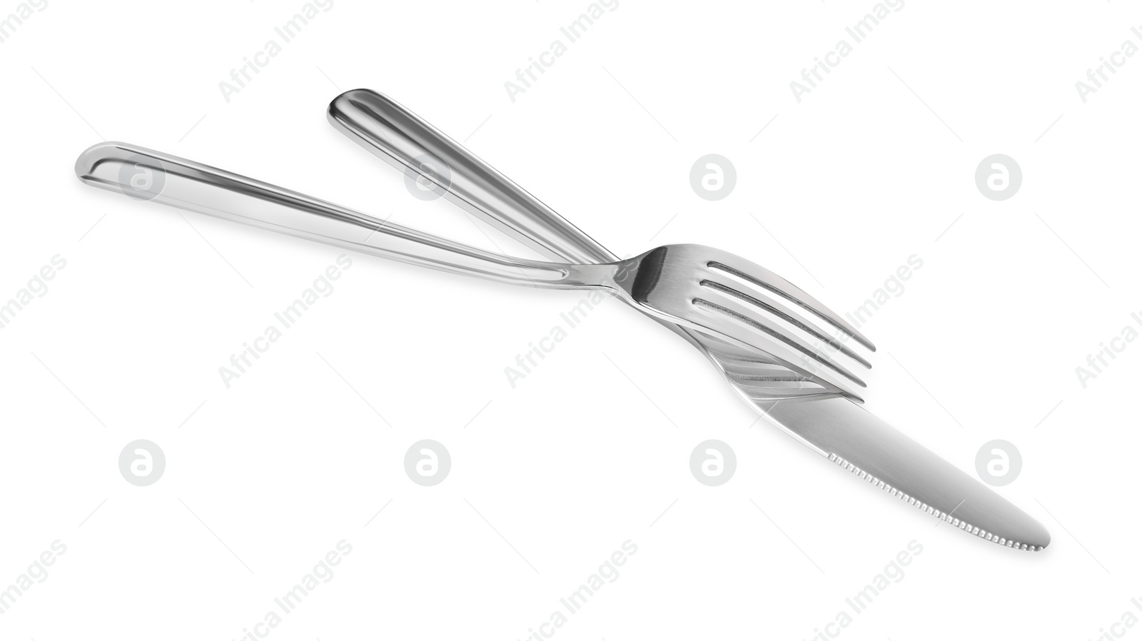 Photo of Fork and knife isolated on white. Stylish shiny cutlery set