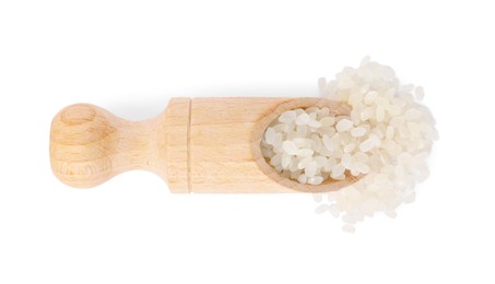 Scoop with raw rice isolated on white, top view