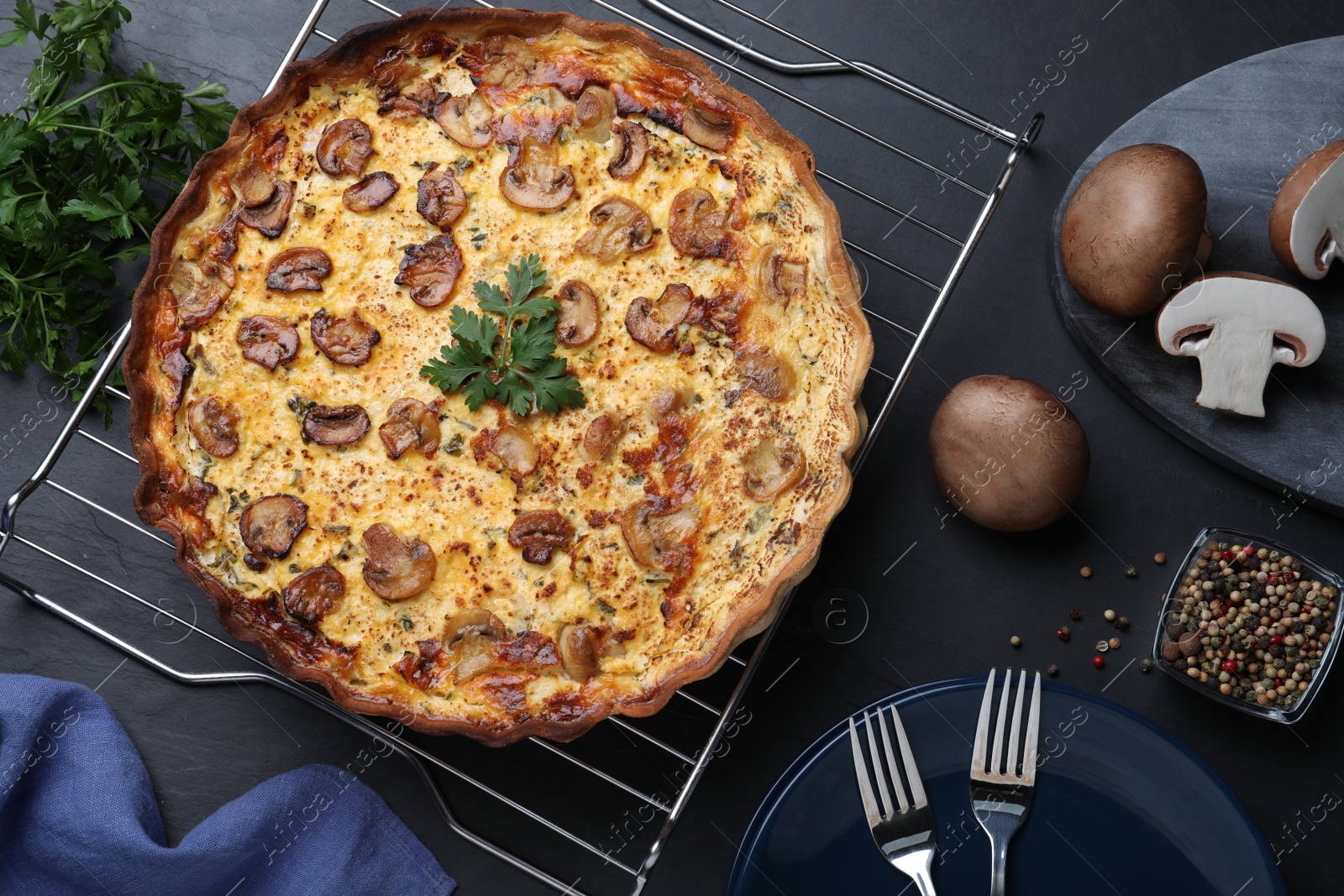 Photo of Flat lay composition with delicious homemade mushroom pie on black table