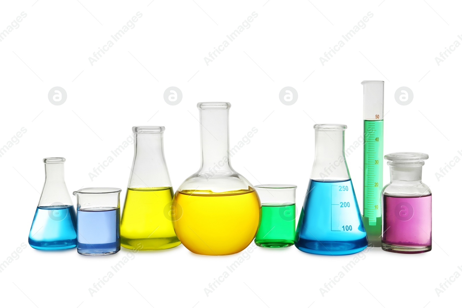 Photo of Laboratory glassware with colorful liquids on white background