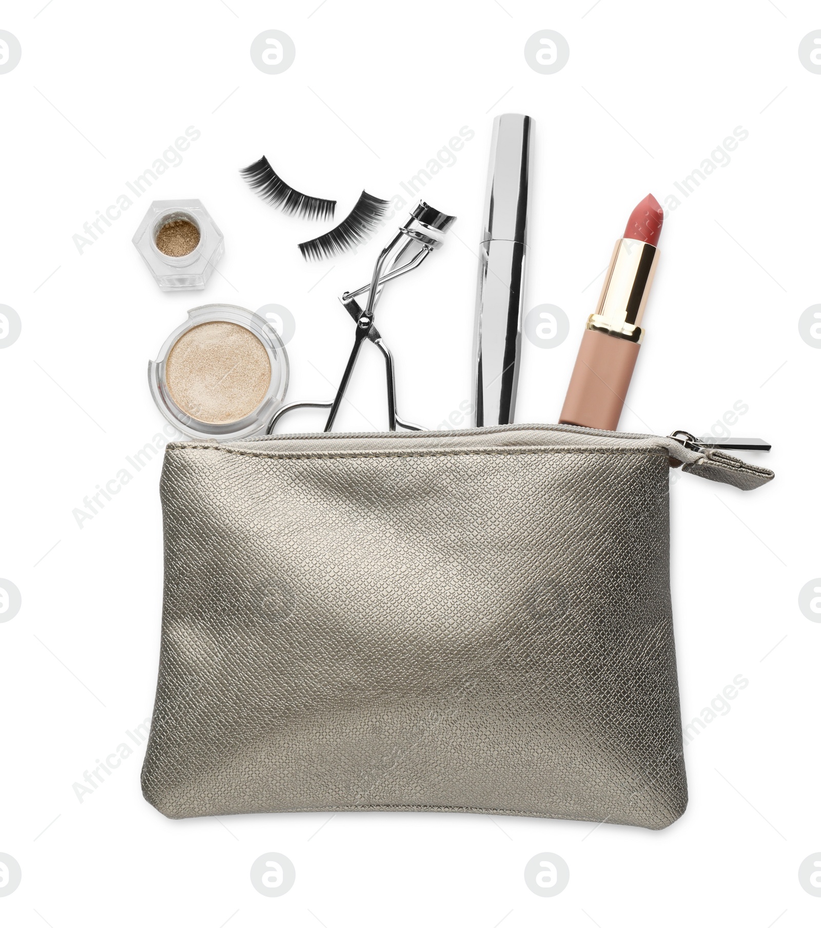 Photo of Cosmetic bag with eyelash curler and makeup products on white background, top view