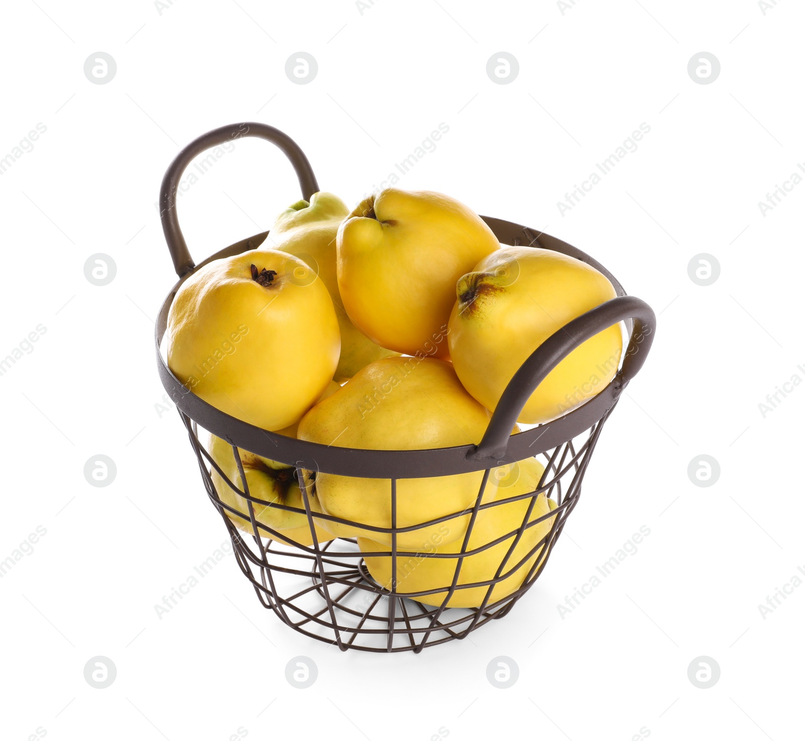 Photo of Fresh ripe quinces in basket on white background