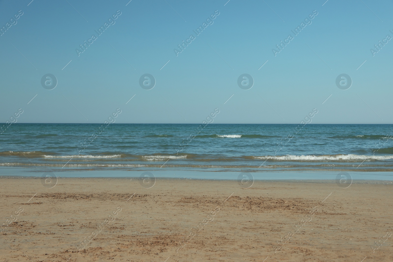 Photo of Beautiful view of sea shore and blue sky on summer day